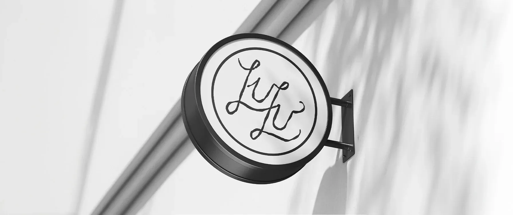 store-sign-lulu-cafe-and-bakery.webp